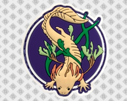 Runder PVC-Patch mit Axolotl-Motiv auf lila Hintergrund – 1a-rubber.de